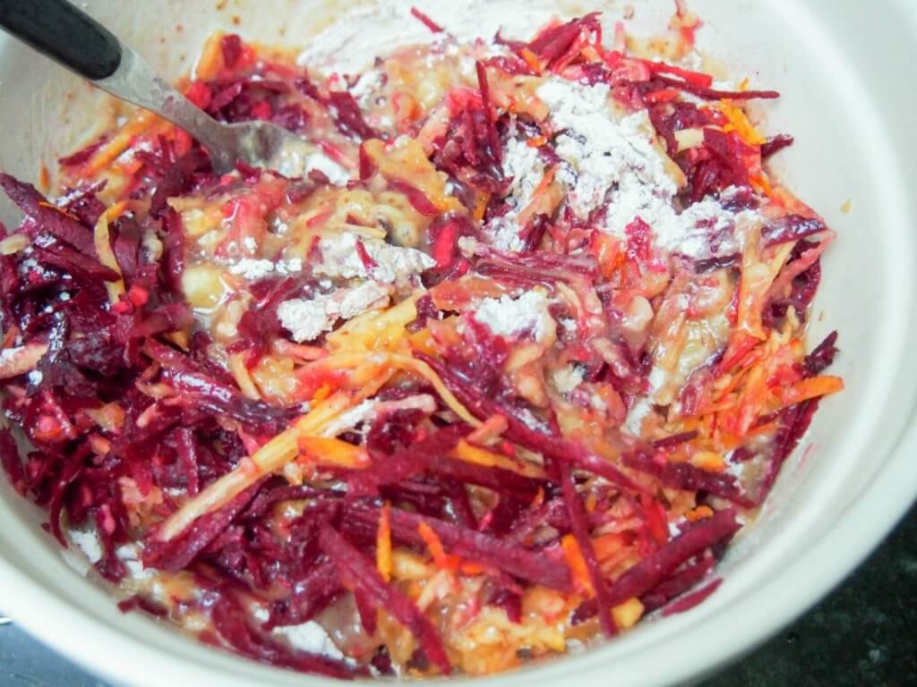 mixing pumpkin beetroot muffins