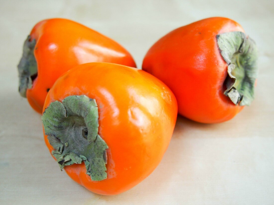 persimmon for persimmon sorbet Three whole Hachiya persimmon