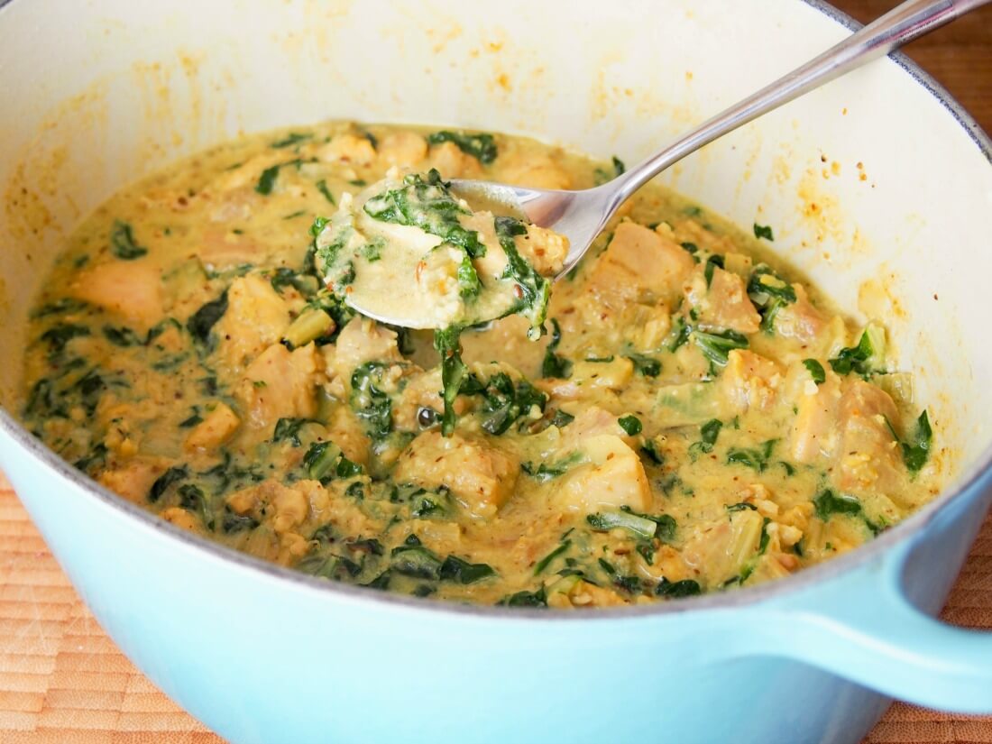 Fragrant chicken curry with chard, coconut and cashew