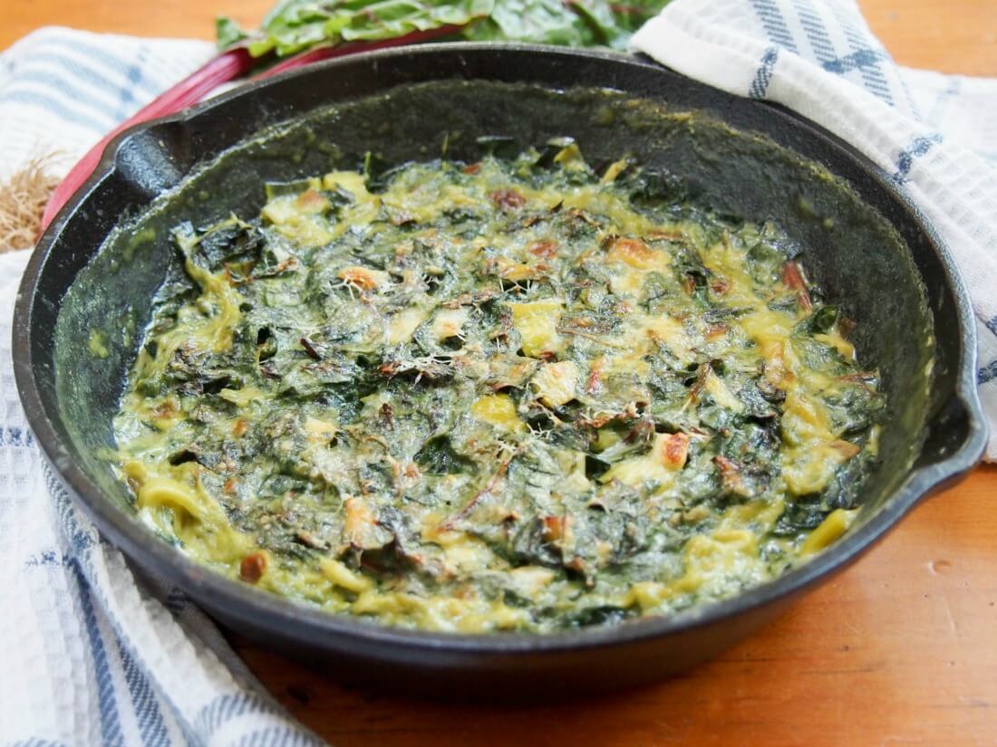 skillet of leek and Swiss chard gratin
