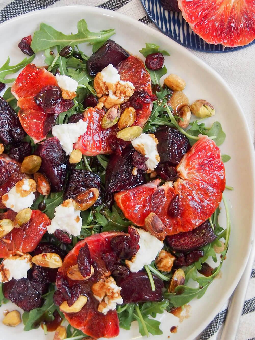 Beet and blood orange salad on plate from overhead