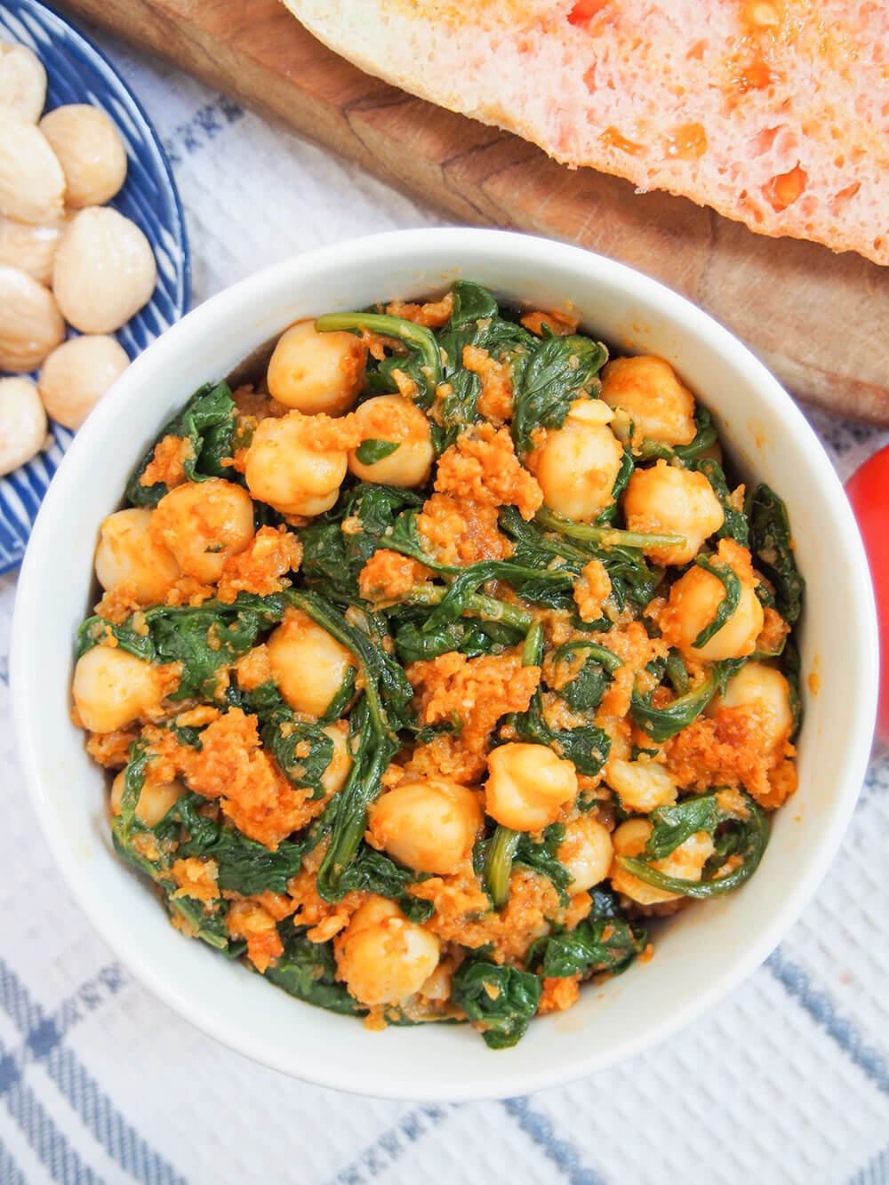 Spanish chickpeas and spinach in bowl viewed from overhead