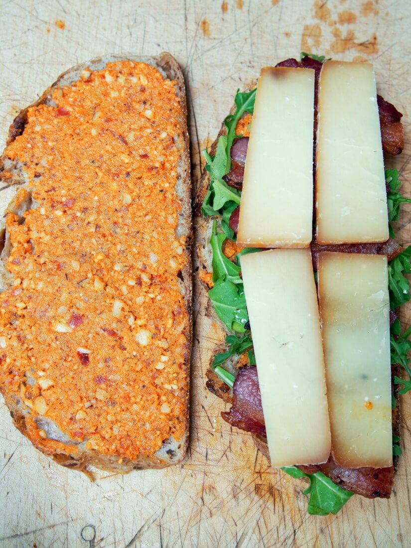 making romesco and bacon grilled cheese