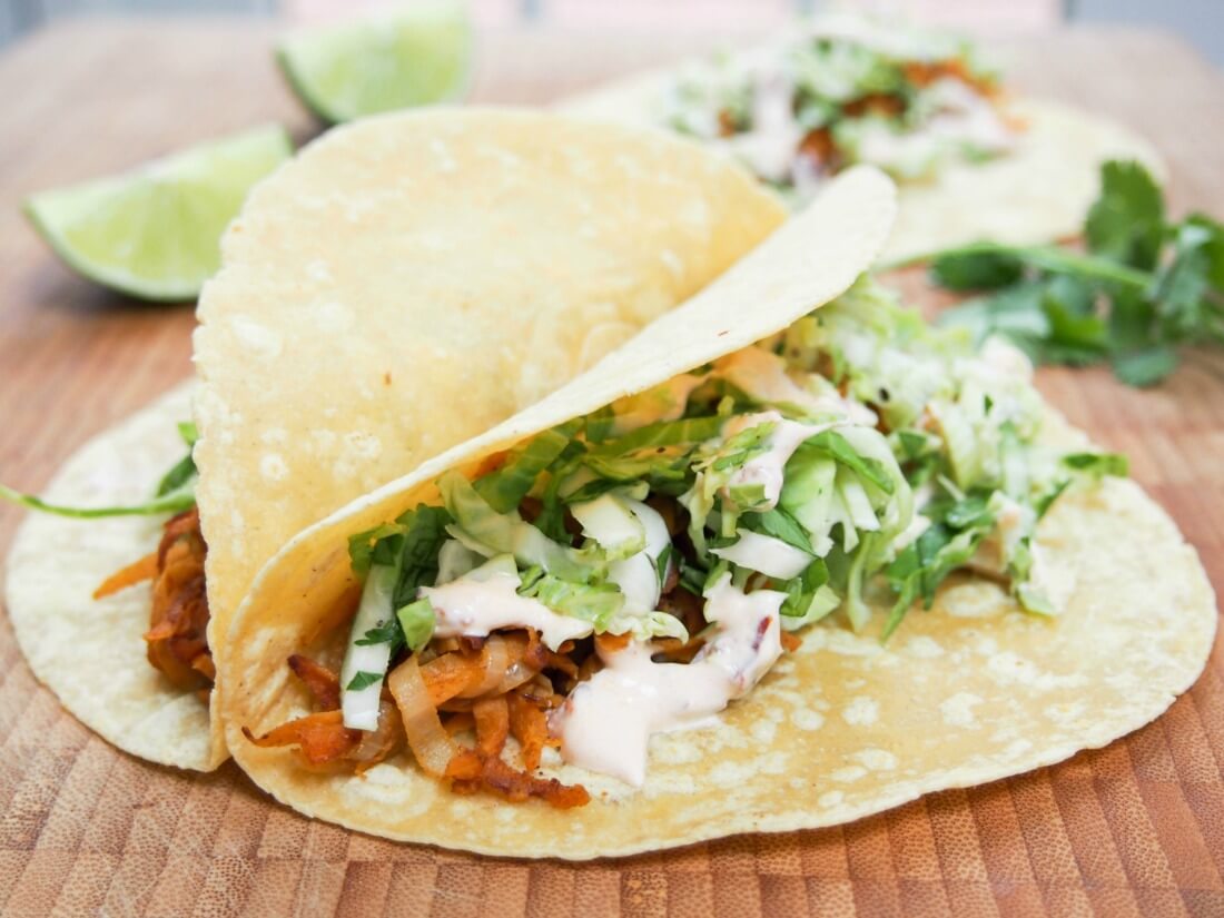 Sweet potato tacos with sprout slaw and chipotle cream