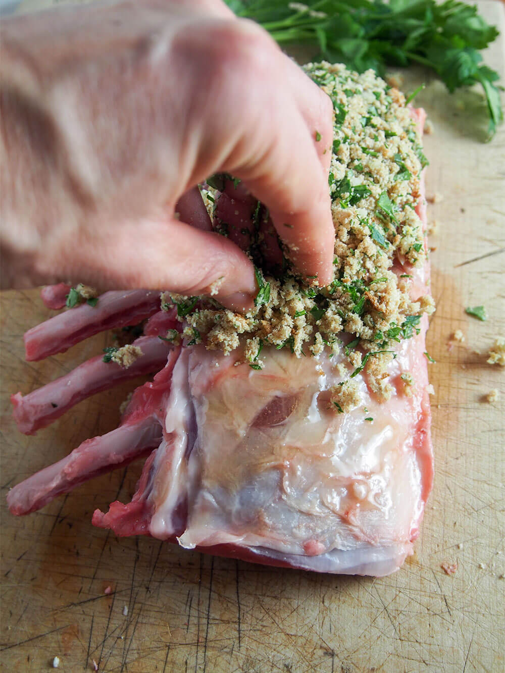 preparig garlic herb crusted rack of lamb