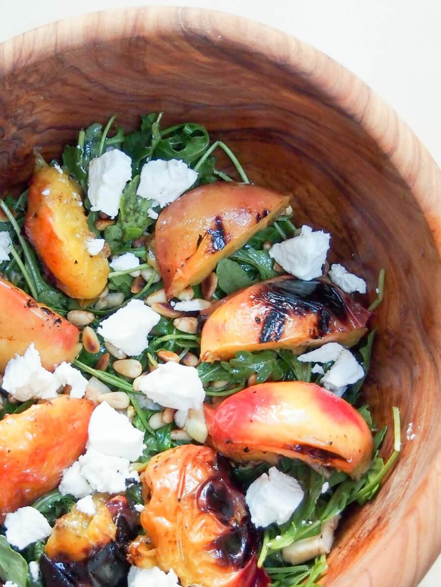 grilled nectarine salad showing part of bowl from overhead