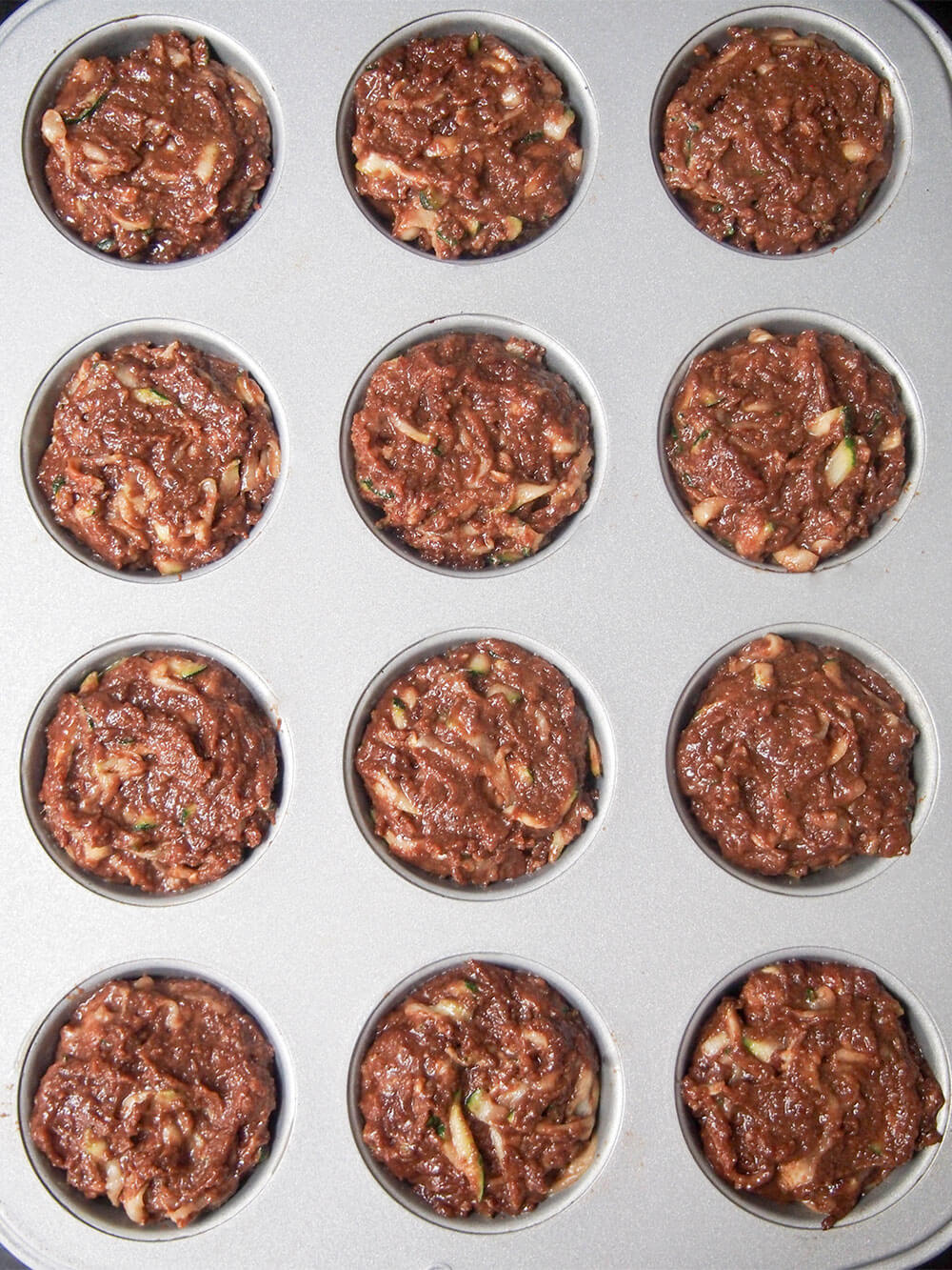 Chocolate zucchini muffins (vegan) ready to bake