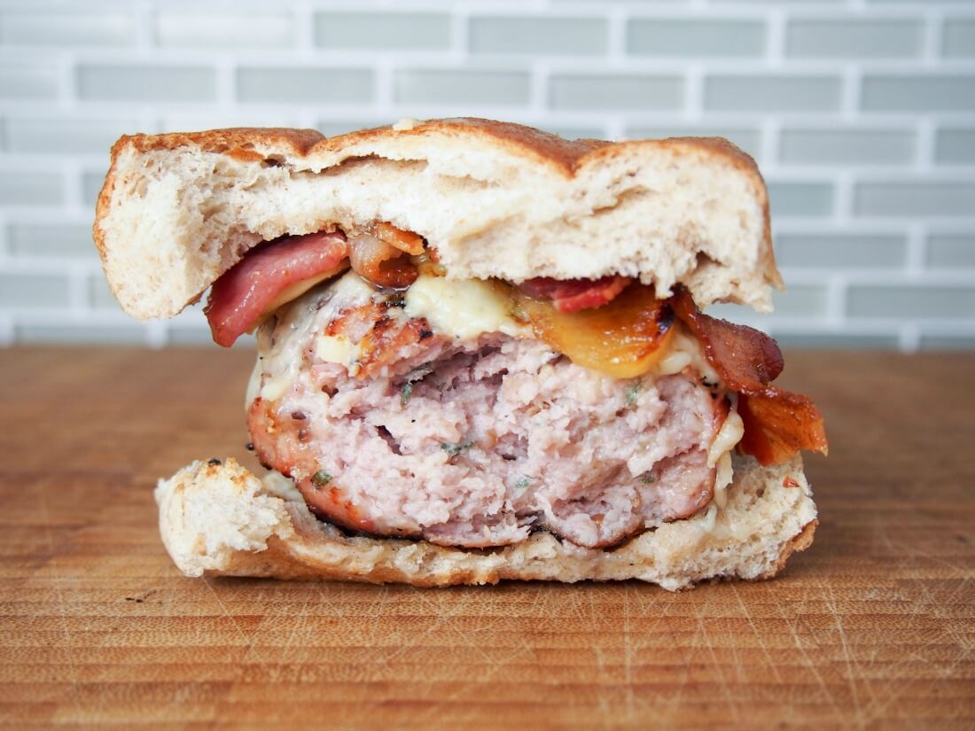 This maple turkey burger is served with delicious cheddar, bacon and apple. Fantastic flavors, easy to make, you'll have everyone wanting more.