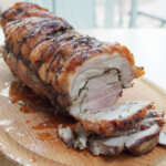 porchetta on chopping board