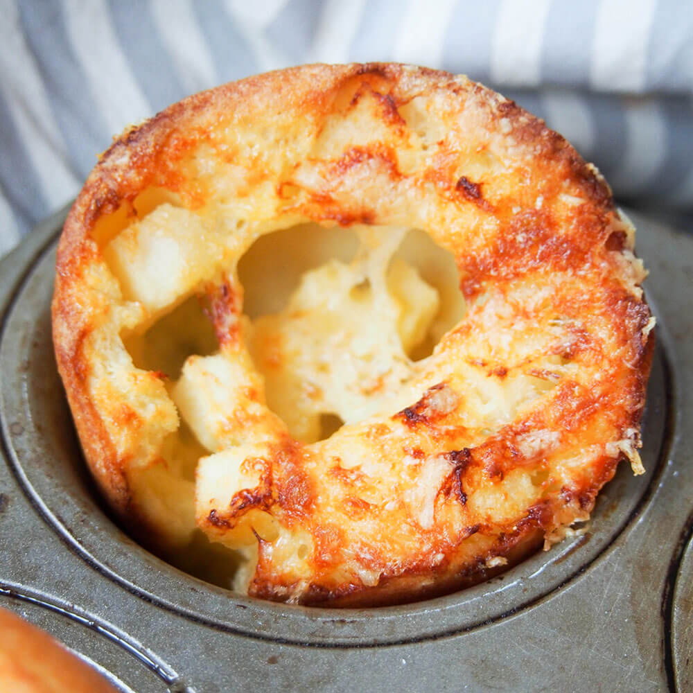 close up of apple and cheddar cheese Yorkshire pudding