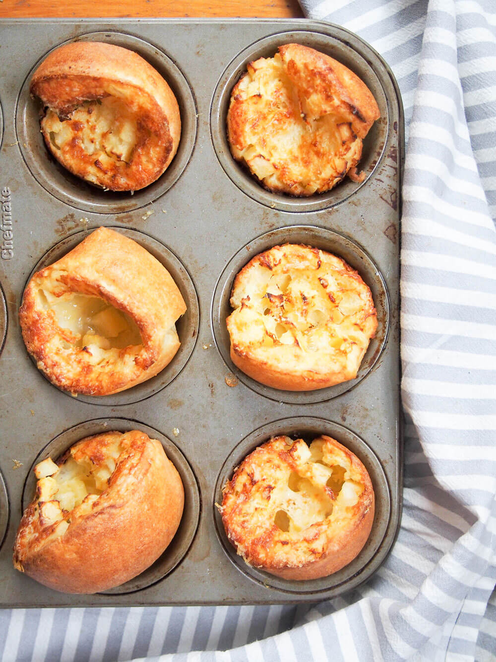 apple and cheddar cheese Yorkshire pudding in pan from overhead