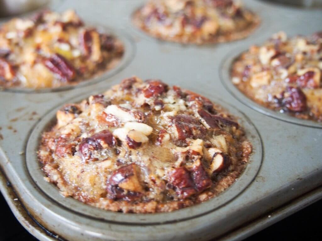 Healthier mini sweet potato pecan pie - With no refined sugar, wholewheat flour and hardly any butter, these mini sweet potato pecan pies are a lot healthier than most but still oh so delicious.