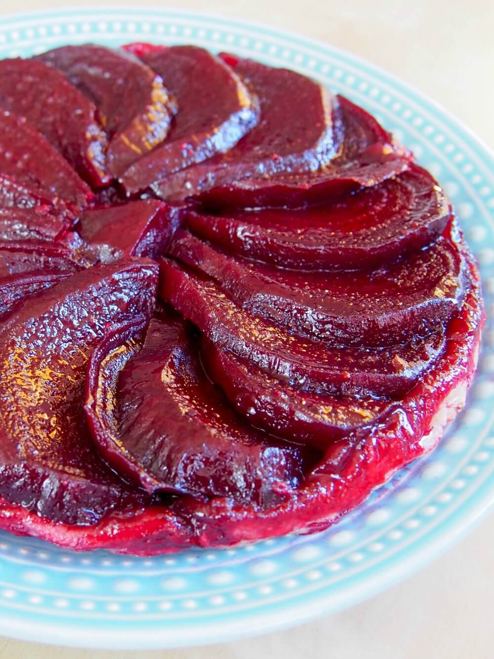 beetroot tarte tatin showing slices of beet fanned out on top of each other