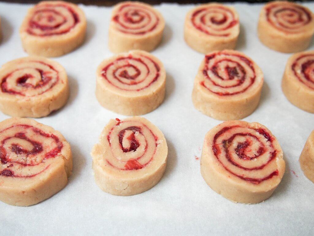 making Cranberry-pomegranate-filled shortbread spiral cookies