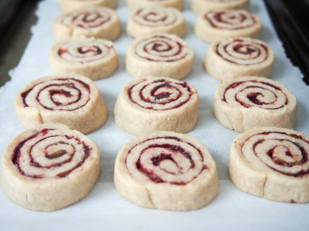 Cranberry-pomegranate-filled shortbread spiral cookies