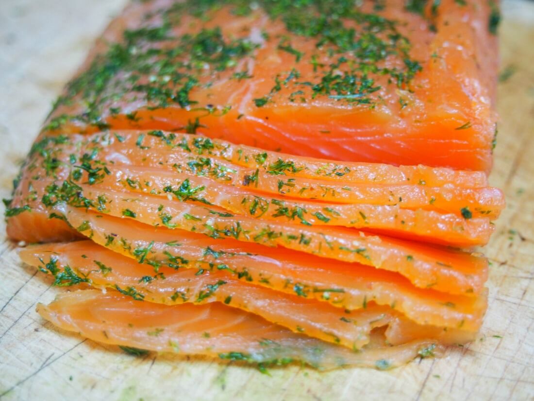 slicing salmon gravlax