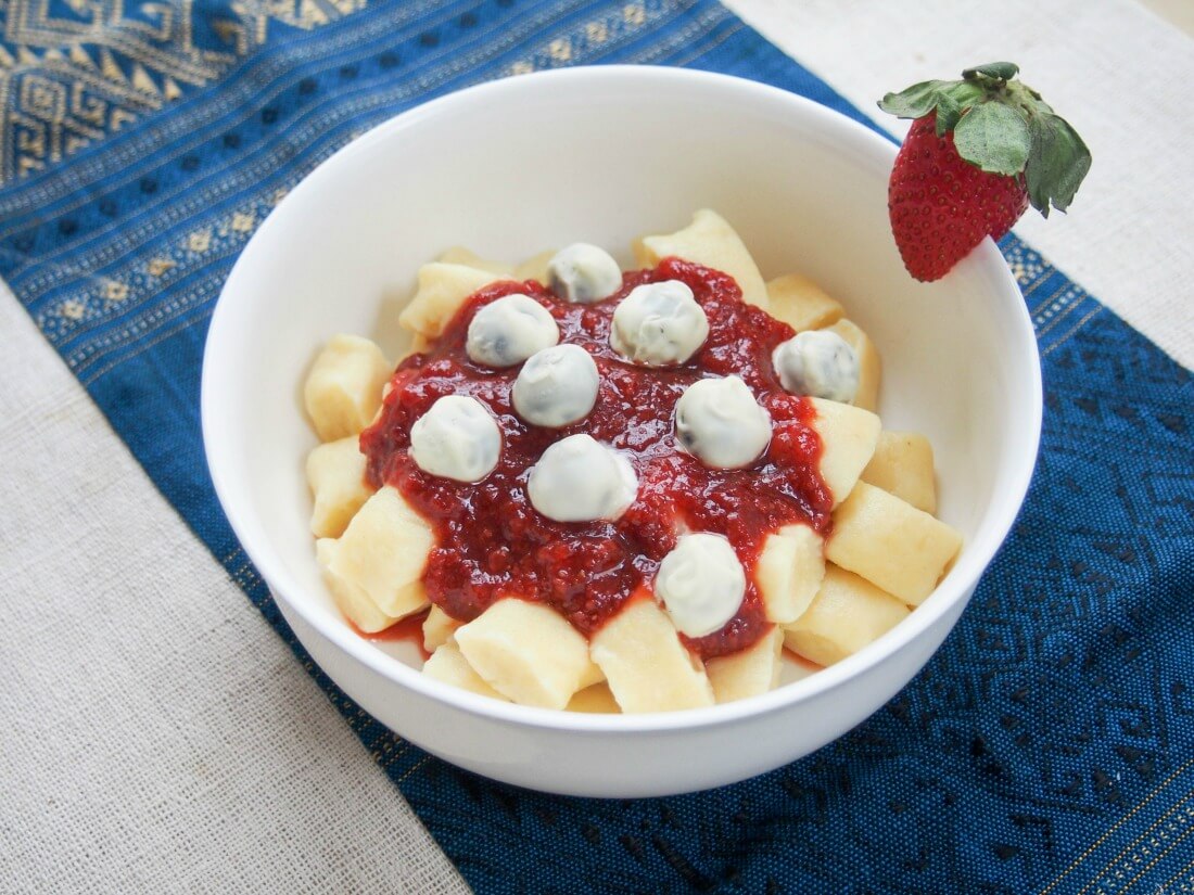Dessert gnocchi with balsamic strawberry sauce