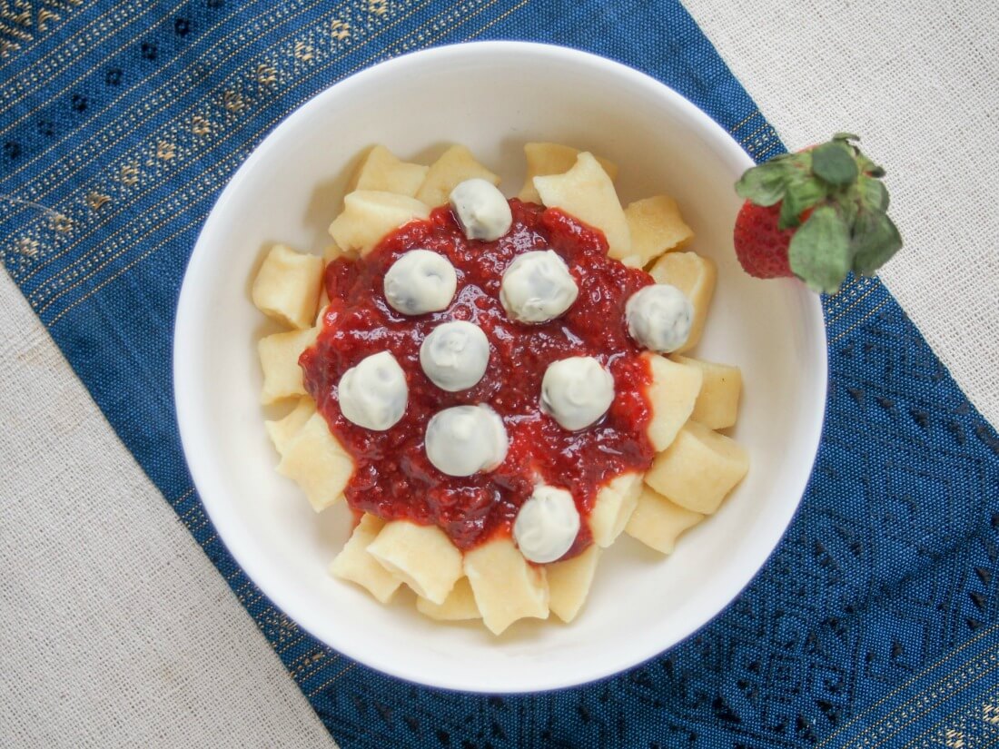 Dessert gnocchi with balsamic strawberry sauce