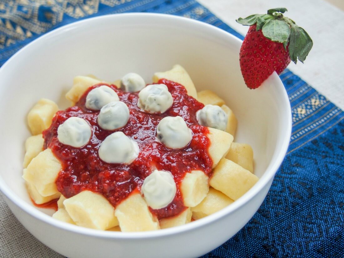 Dessert gnocchi with balsamic strawberry sauce