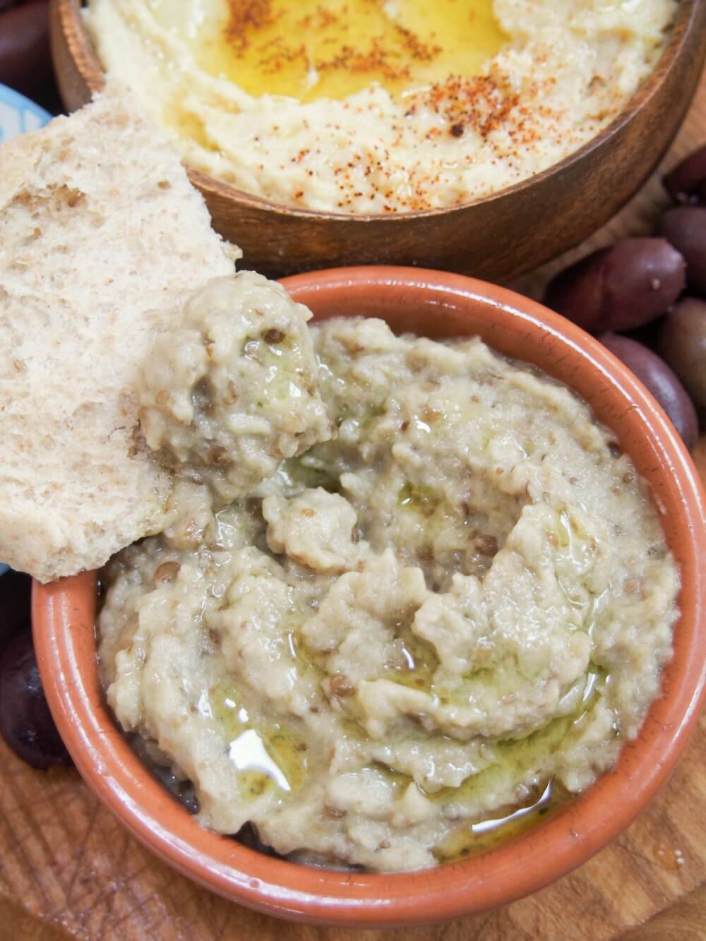 Baba ghanoush (or baba ganoush) is one of many dips/spread that's a staple on mezze plates. This eggplant dip tastes so creamy, with a wonderful smokey flavor, but it's entirely vegan. Easy, versatile and moreishly delicious. baba ghanoush eggplant dip/spread (baba ganoush)