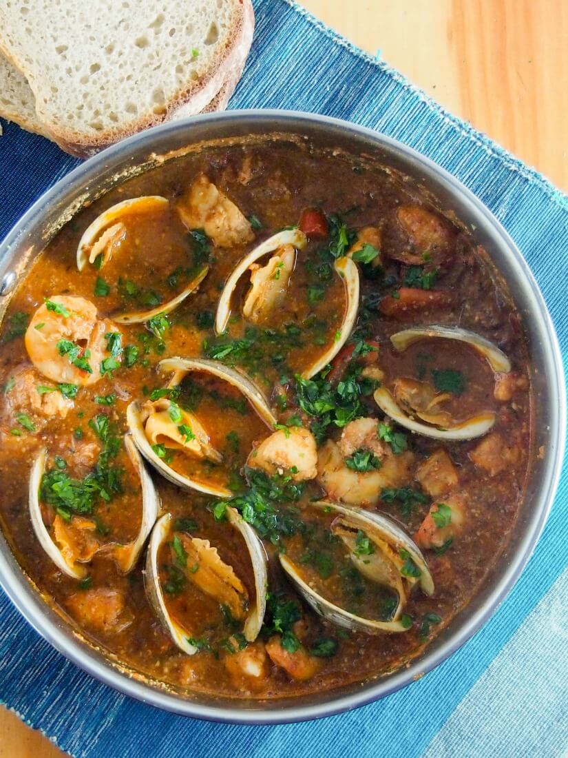 Romesco de peix, Catalan fish stew, is a wonderfully flavorful mix of seafood in a sauce made with almonds, peppers, tomato and garlic. It's comforting without being too heavy. Truly delicious. Romesco de peix, Catalan fish stew, is a wonderfully flavorful mix of seafood in a sauce made with almonds, peppers, tomato and garlic. It's comforting without being too heavy. Truly delicious.