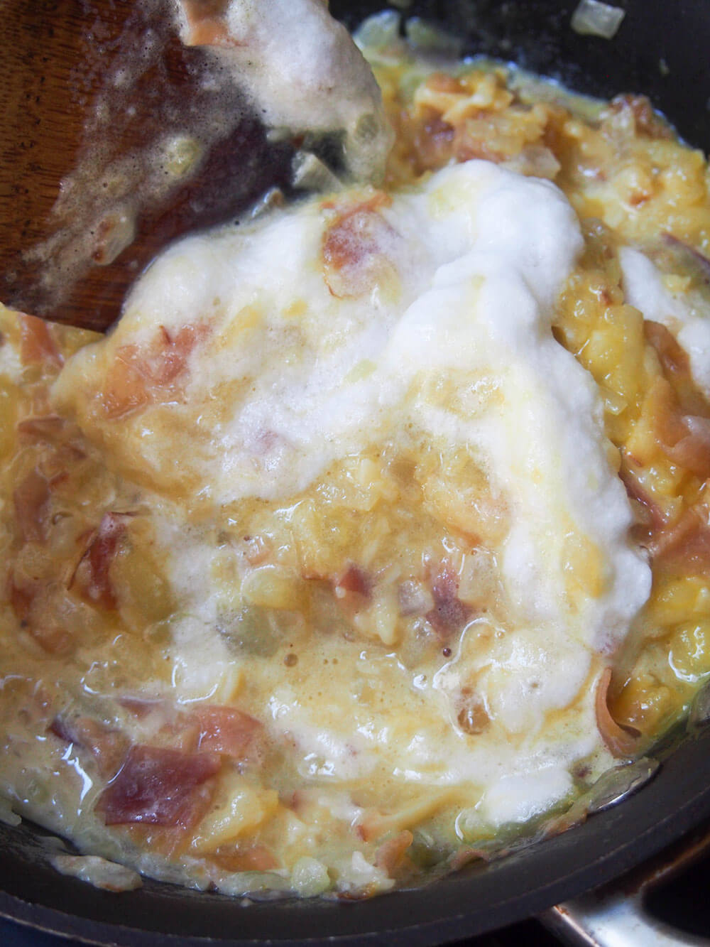 folding egg whites into rest of mixture