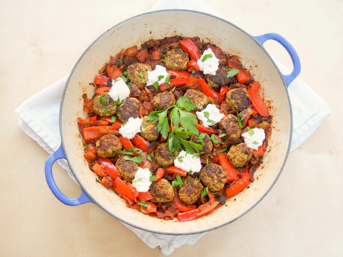 kofte style lamb meatballs in a tomato pepper sauce