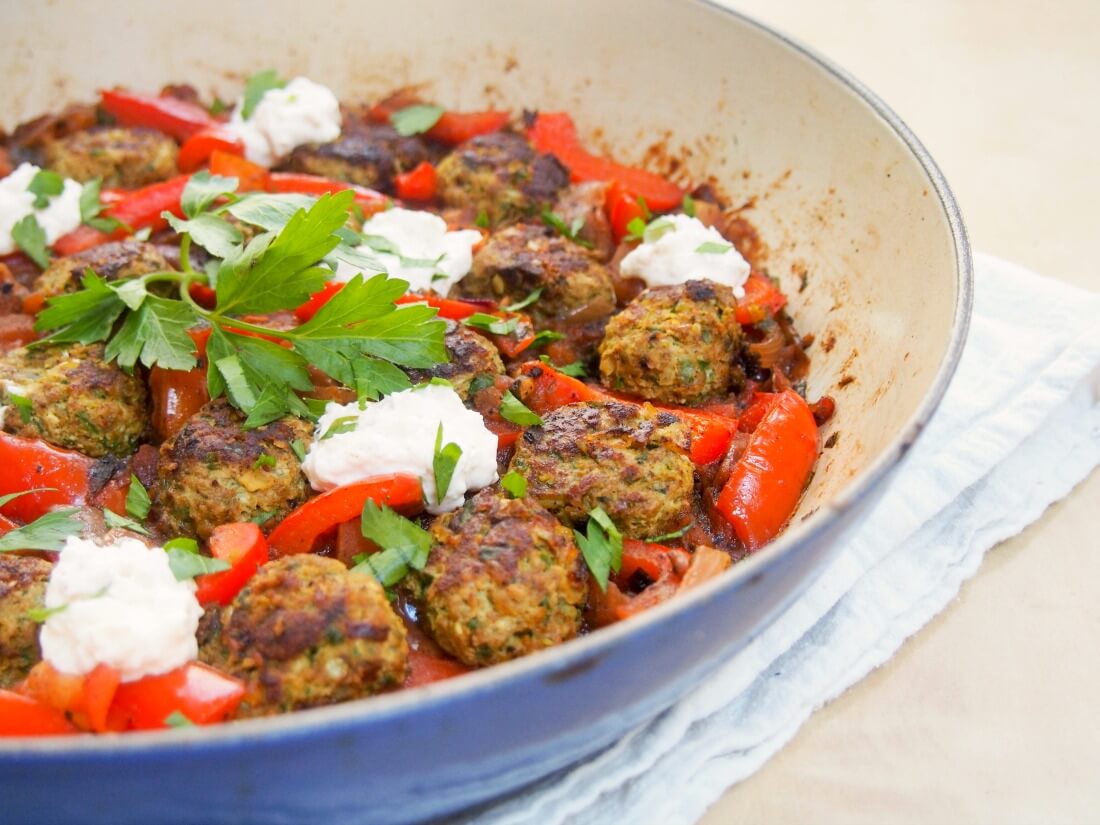 kofte style lamb meatballs in a tomato pepper sauce