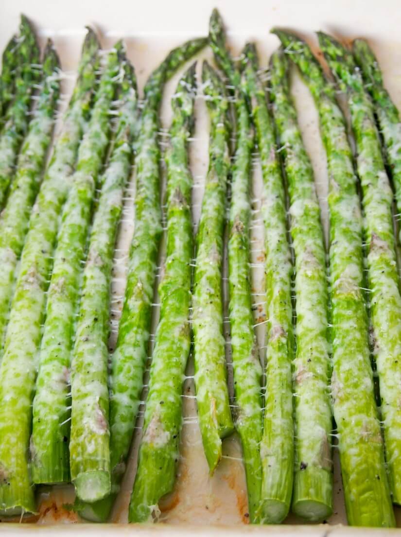 Roasted asparagus with parmesan is an incredibly easy way to prepare asparagus but you'll be amazed at how good it tastes as a result. A great side dish.