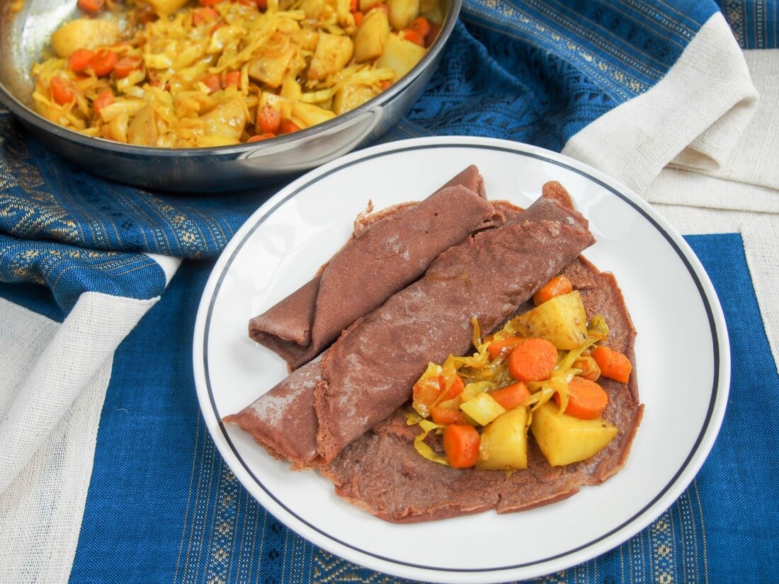 Ethiopian injera and tikel gomen