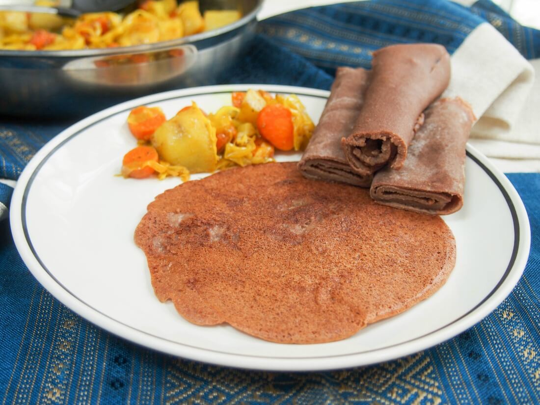 Ethiopian injera and tikel gomen