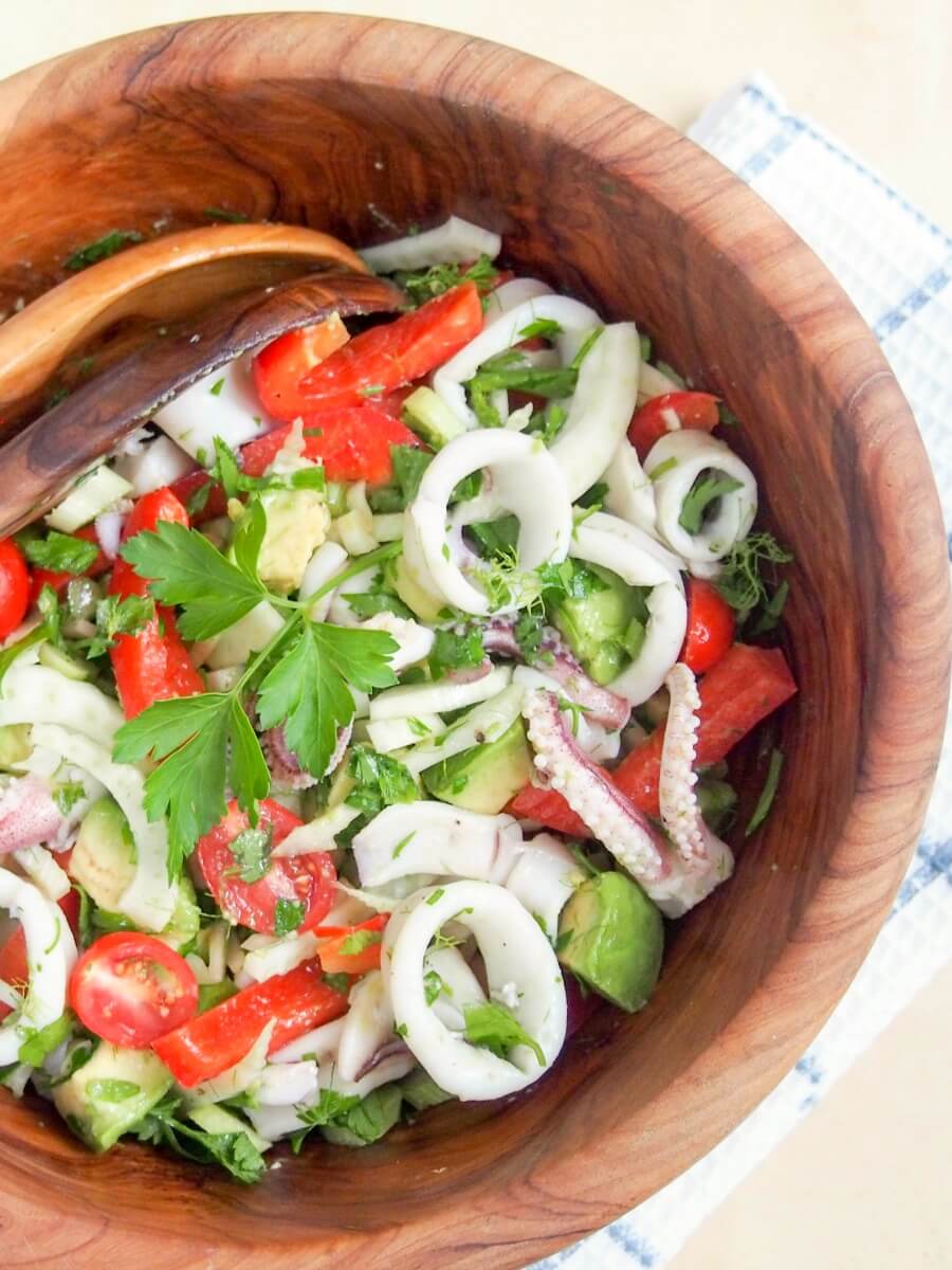 This calamari salad with fennel and avocado is a lovely mix of textures and flavors, all brought together with a citrus dressing. Perfect potluck side or appetizer.