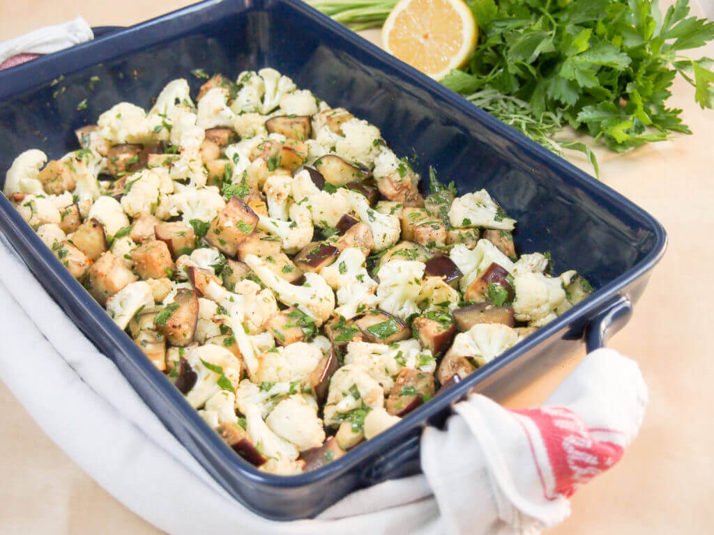 This roasted cauliflower and eggplant salad/side makes a versatile accompaniment to many meals. Great roasted veg flavor with a fresh herby, citrus dressing.