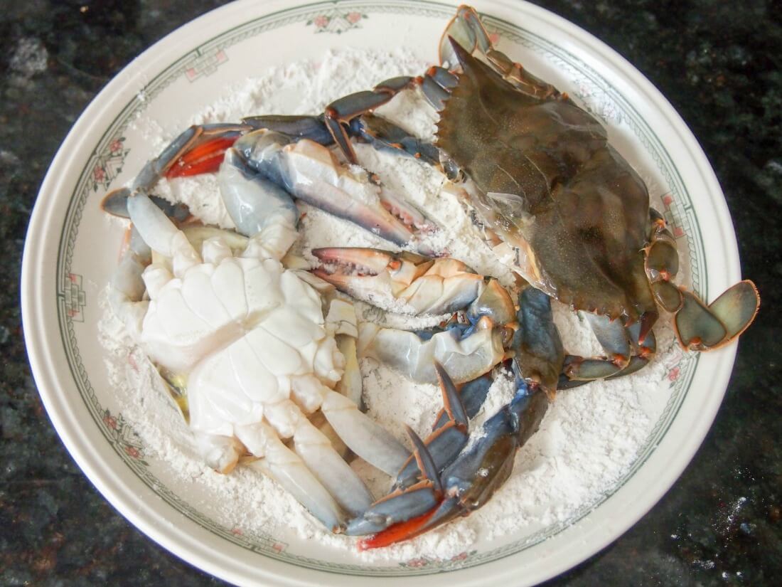 preparing crab for bahn mi-style soft shell crab sandwich