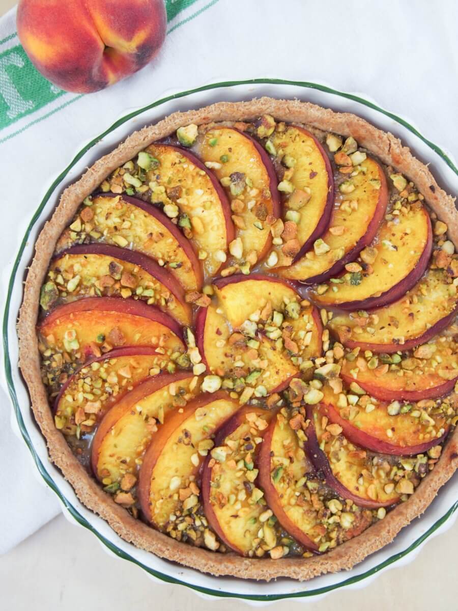 peach and pistachio tart with peach to side