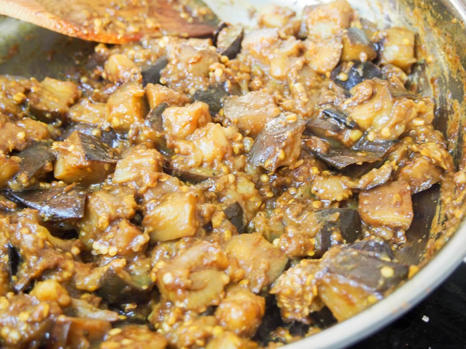 cooking brinjal pickle in pan