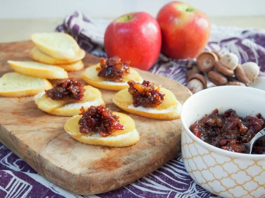 These caramelized apple and bacon jam crostini are a delicious sweet-savory mix, easy to prepare largely in advance and sure to be a hit with guests.