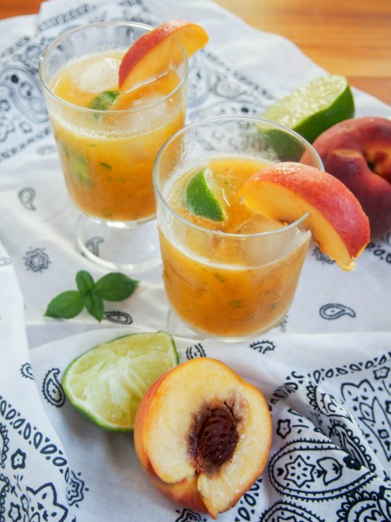 This basil peach margarita is deliciously fresh and fruity, easy to make and all too easy to enjoy. Perfect for taco Tuesday, parties or just because.