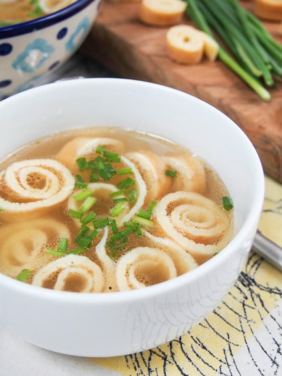 close up of German pancake soup topped with chives