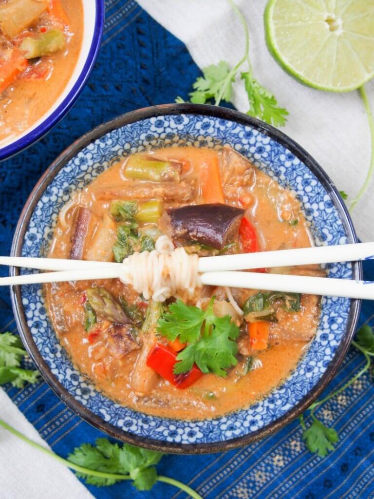 Vegetarian Thai red curry - an easy vegan curry from scratch that's full of veggies, creamy coconut and spicy flavor.