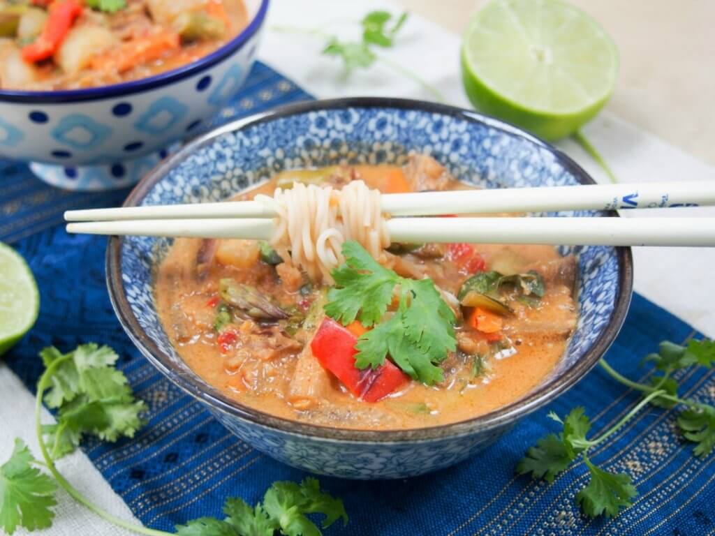 Vegetarian Thai red curry - an easy vegan curry from scratch that's full of veggies, creamy coconut and spicy flavor.