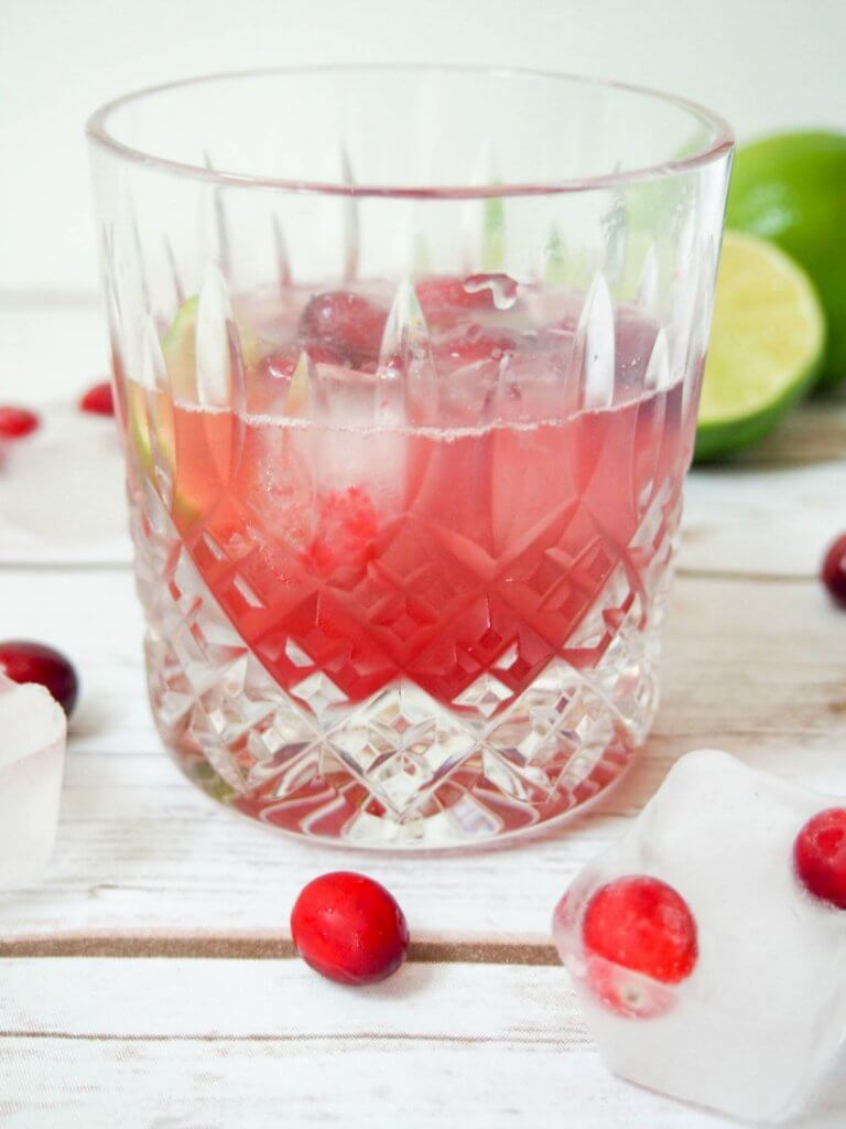 Make an already easy, delicious cocktail even more colorful and festive - this cranberry caipirinha is refreshing and the perfect drink to toast the Holidays.