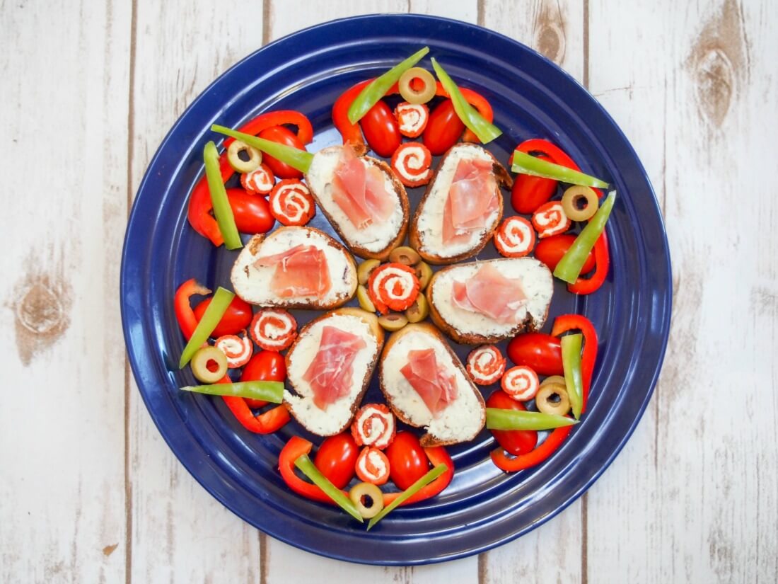 smoked salmon pinwheels & prosciutto crostini