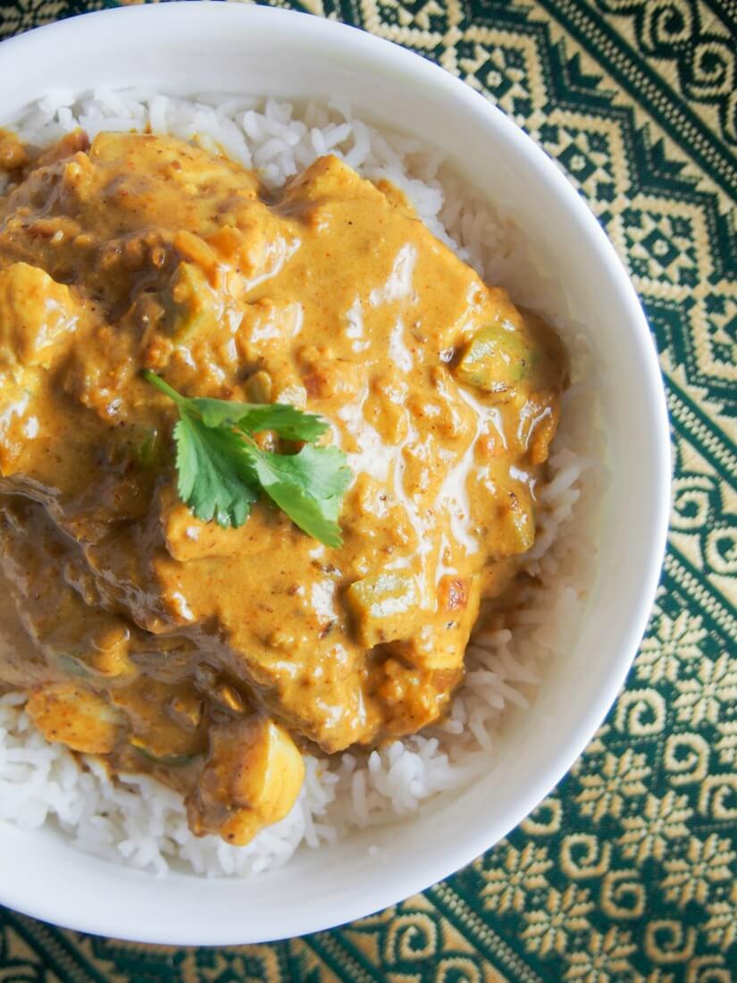 Goan fish curry over rice viewed from overhead