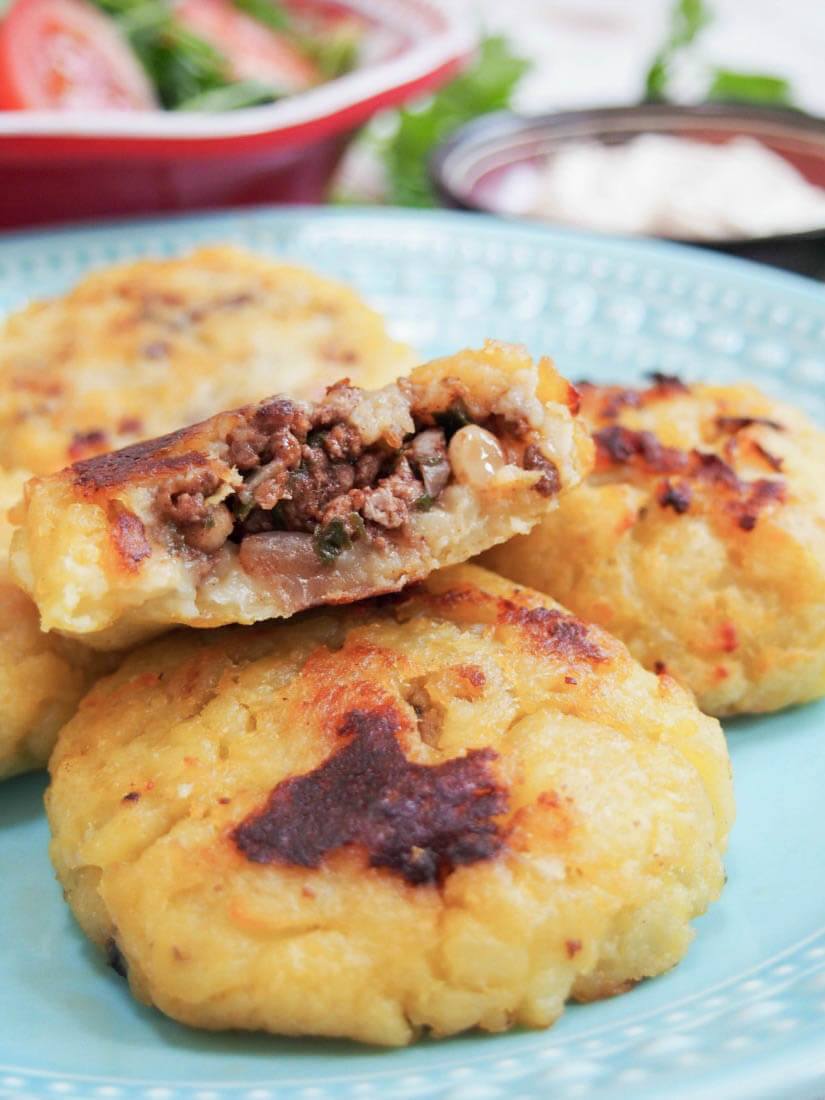 Persian lamb stuffed potato cakes - These Persian lamb stuffed potato cakes are a delicious combination of soft mashed potato around a spiced lamb filling. A great snack or part of mezze plate