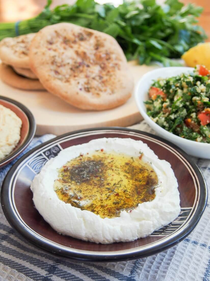 If you've tried labneh as part of a mezze meal, you might be surprised to know it's really easy to make yourself at home. Just 3 ingredients & a few min to prep to make this tasty, cream cheese popular in Israel/Jordan and the area.