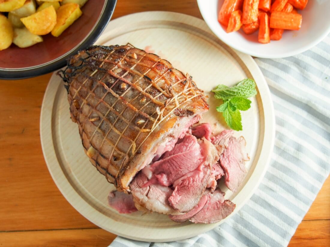 roast boneless leg of lamb on a bed of mint