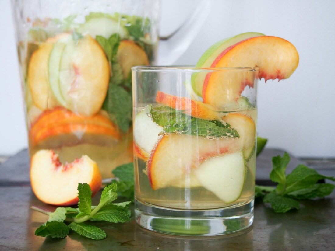white sangria with whiskey, apple and peach