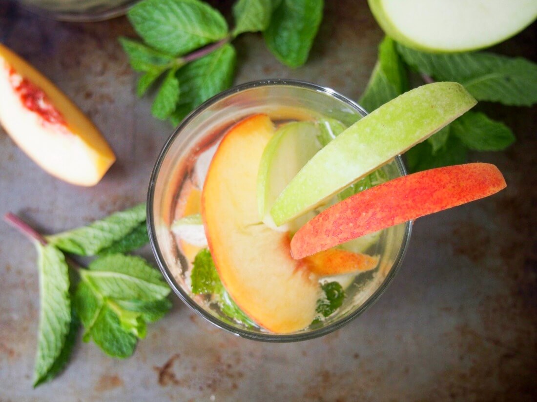 white sangria with whiskey, apple and peach