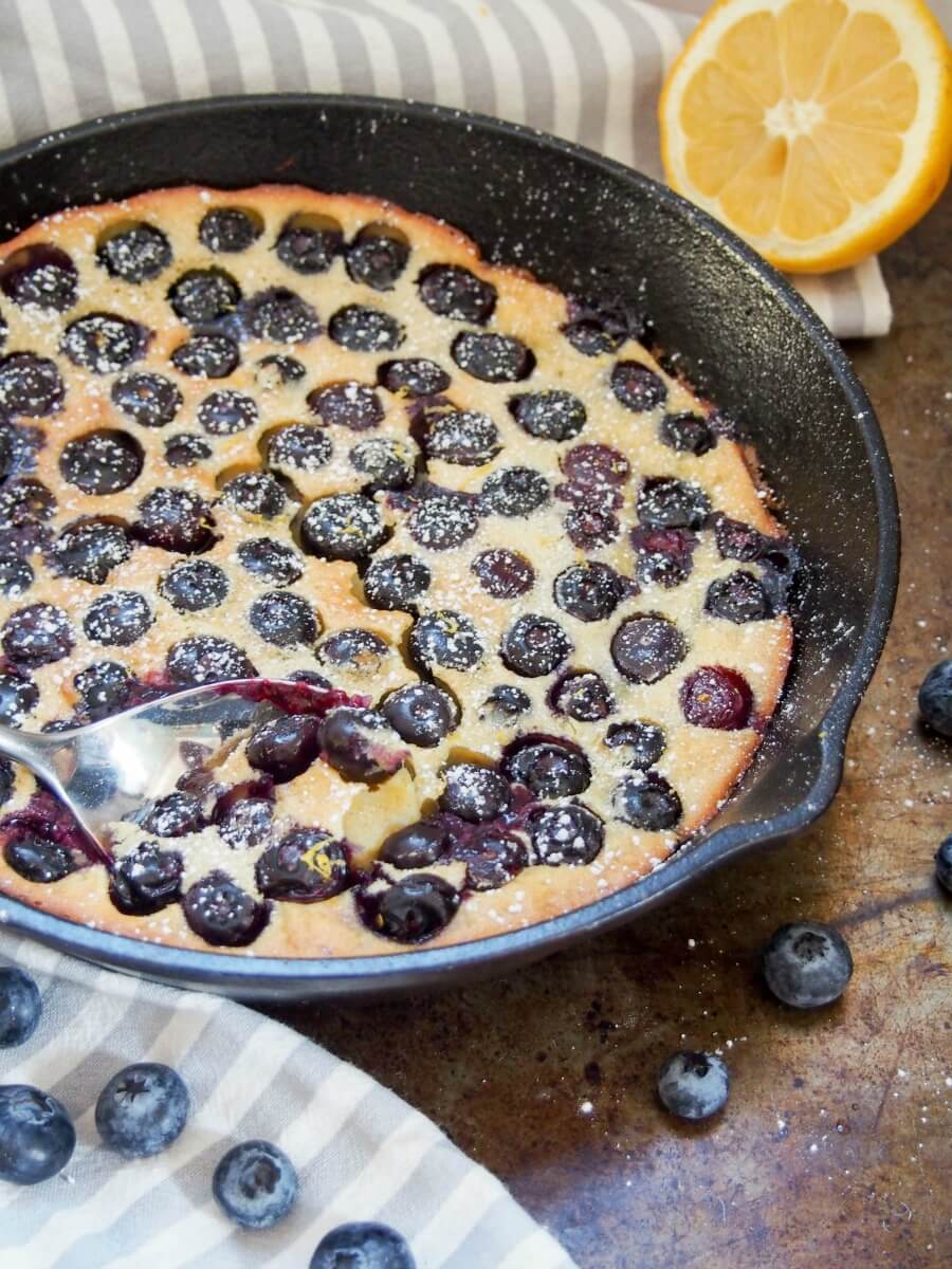 Blueberry clafoutis is a super easy, delicious French dessert, somewhere between a custard and a pancake. Recipe with gluten free version.